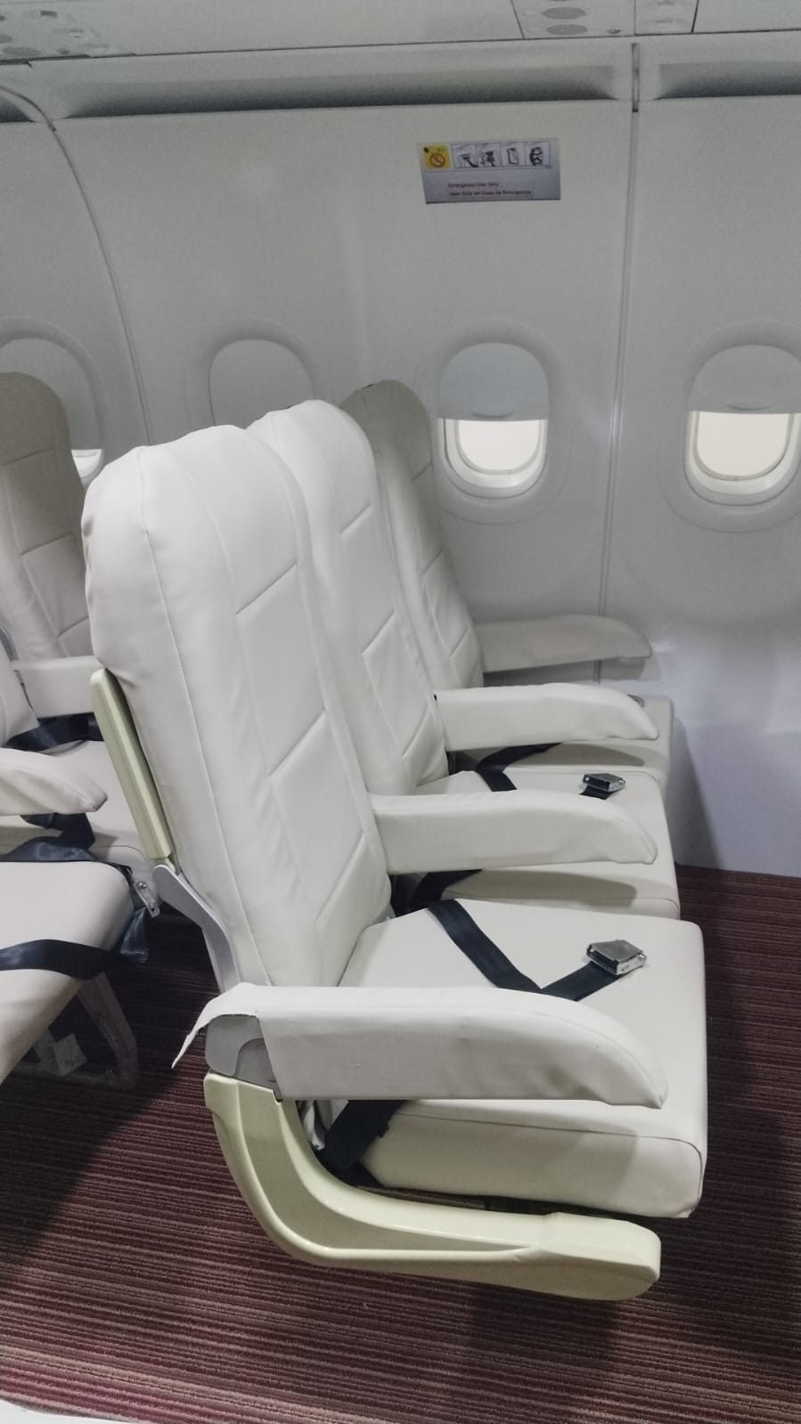 Close detail of cream aircraft seat