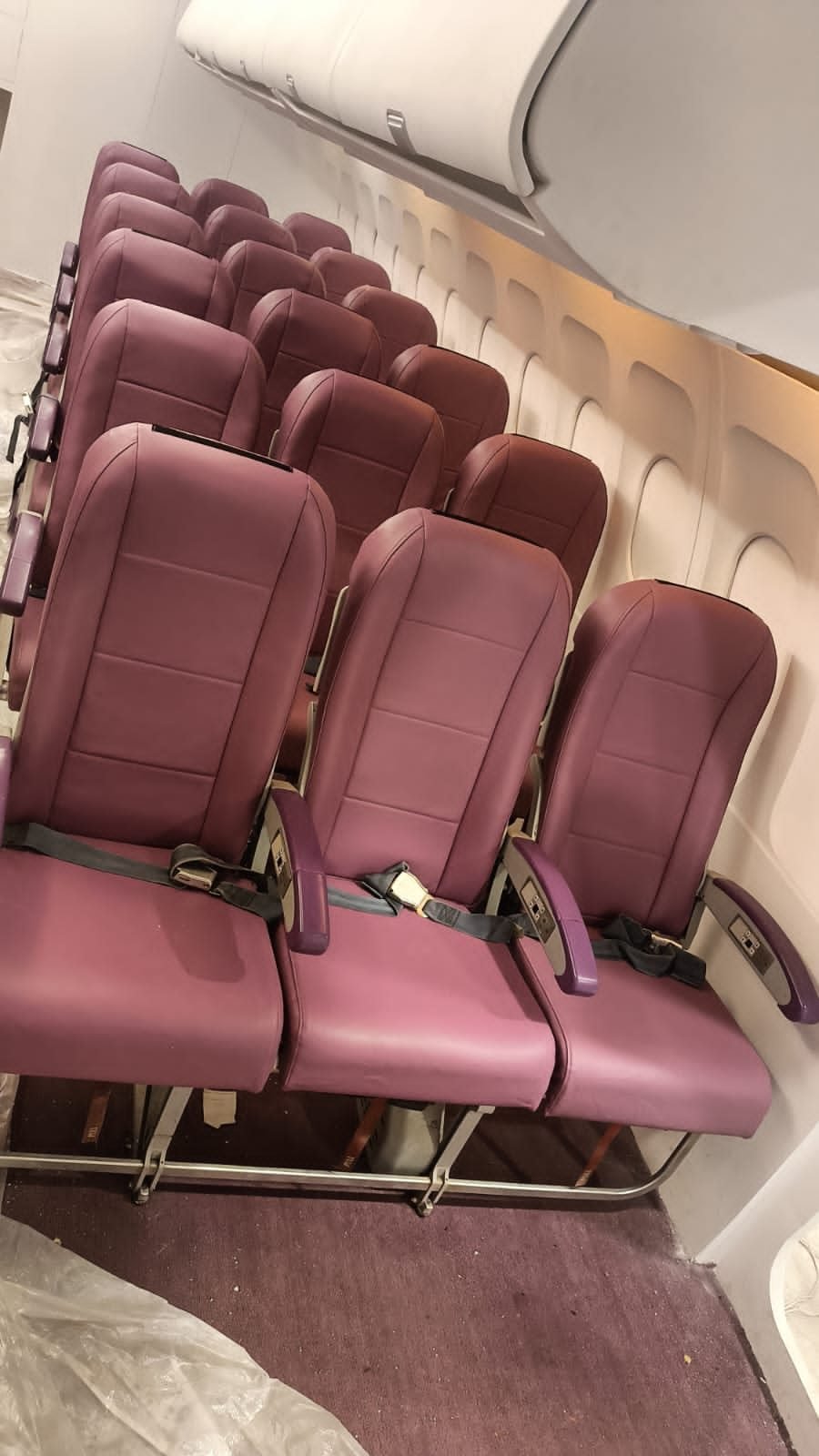Rows of maroon aircraft seating
